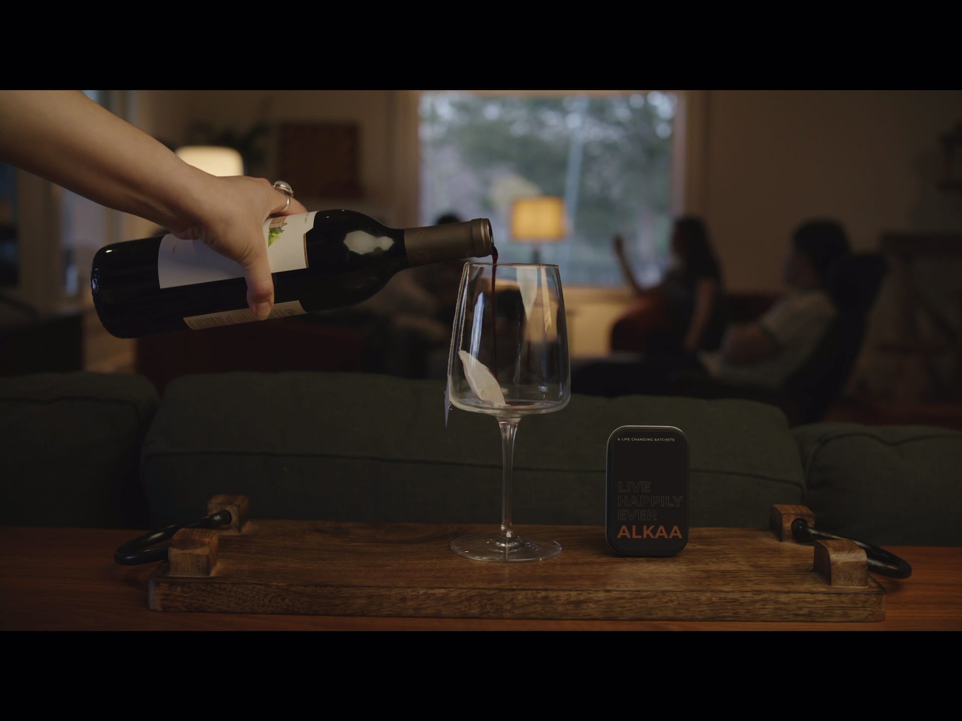 ALKAA sachet hangover prevention cure wine pouring into bottle video.  Alcohol intolerance prevention